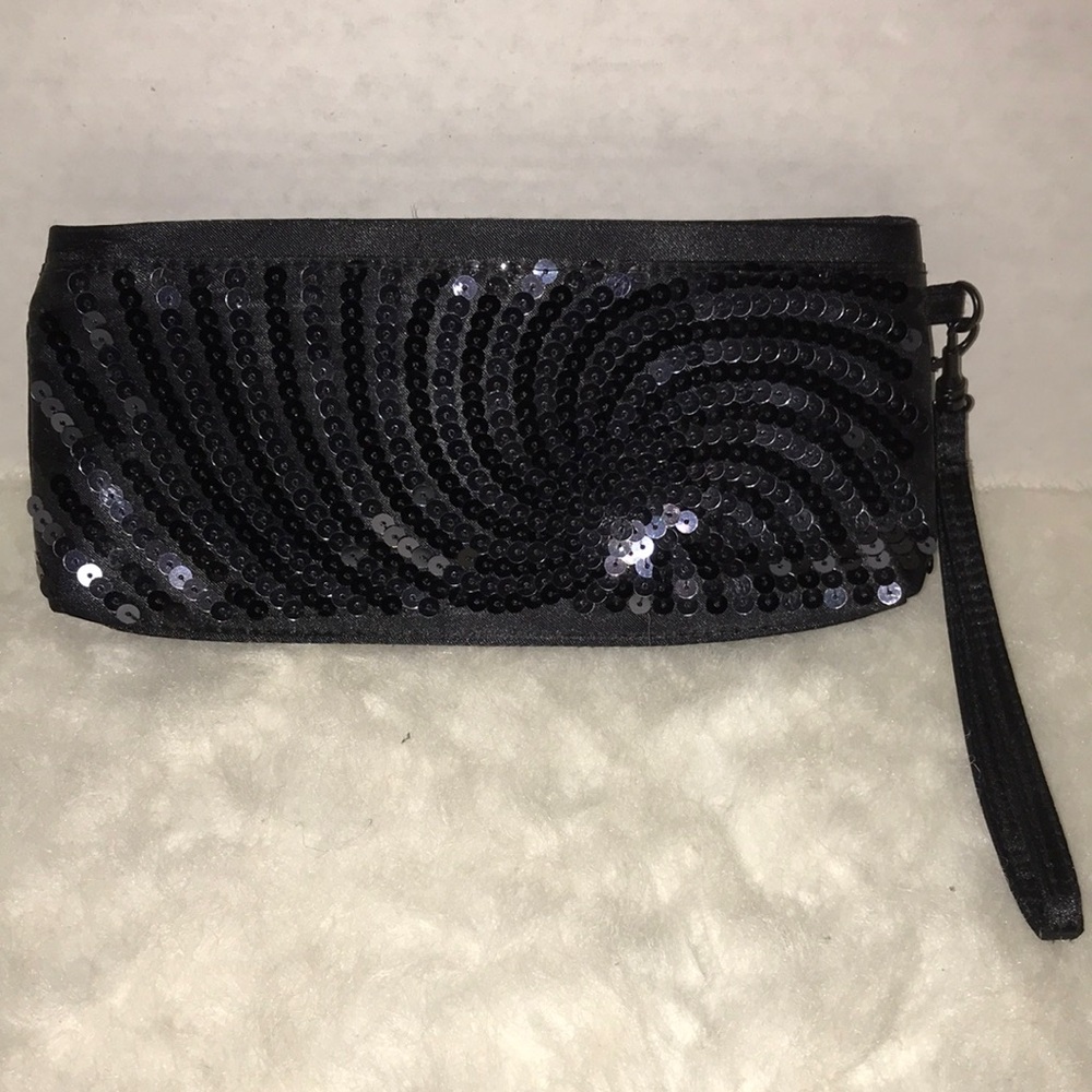 Sephora wristlet bag with sequins.